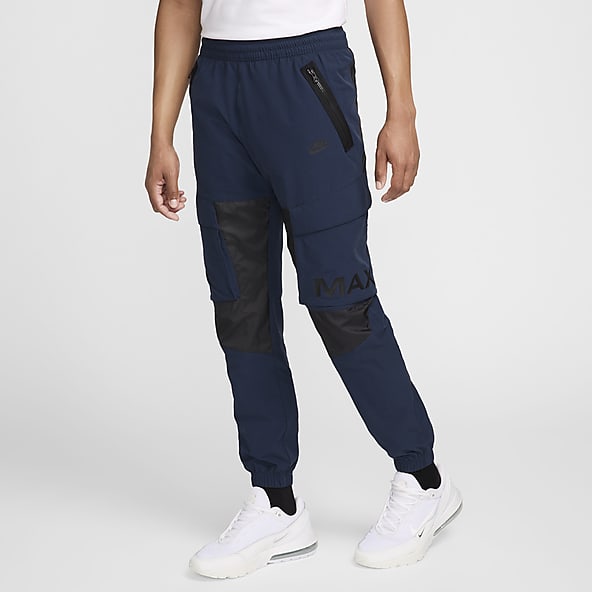 Blue nike track pants clearance